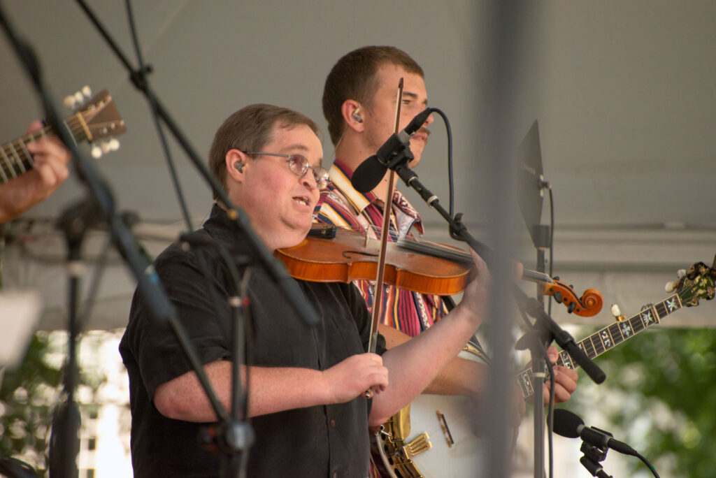 Michael Cleveland plays on stage